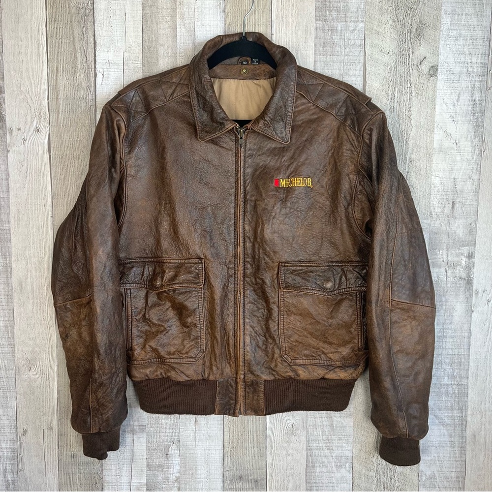 Vintage LeatherTown Bomber Aviator
Leather Jacket Size 40 Embroidered
Michelob - Picture 10 of 16